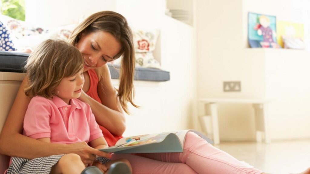 Mother Helping Daughter Read